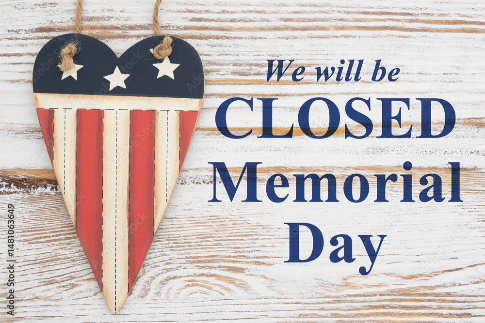 Fototapeta premium Closed Memorial Day sign with retro USA red, white and blue star and stripes heart on weathered wood