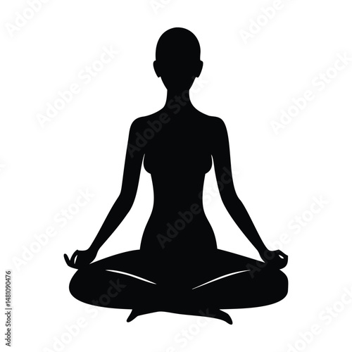 Silhouette of a meditating woman in a yoga lotus pose embodies relaxation and zen