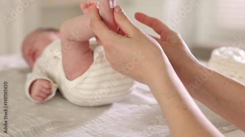 Wallpaper Mural Mother with her newborn baby on bed at home, closeup Torontodigital.ca