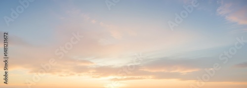 Pastel colored sky with clouds at sunrise or sunset soft and dreamy.