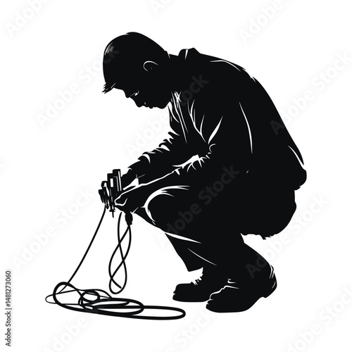 Man tying shoelaces in squat position
