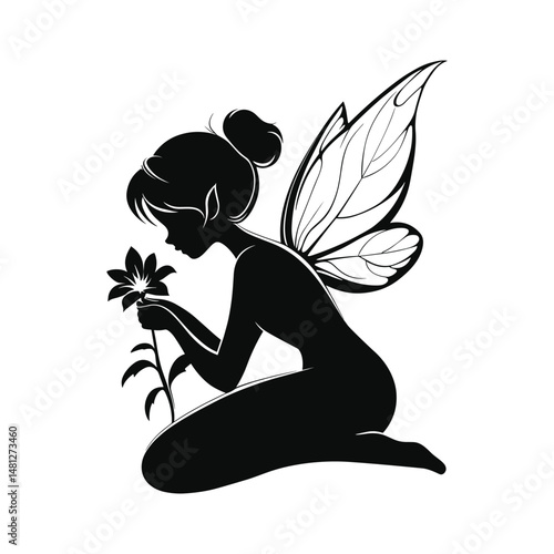 Fairy girl sitting with wings and flower
