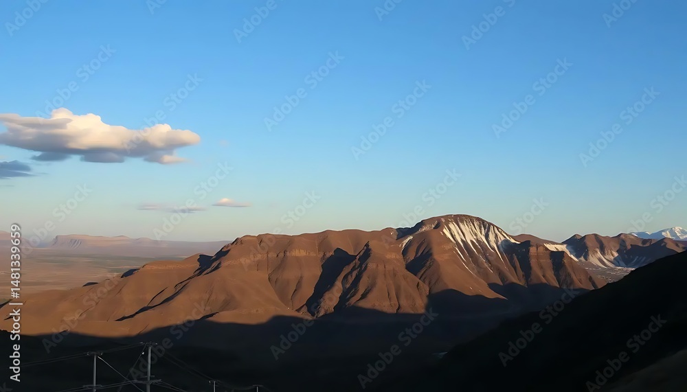 Naklejka premium Scenic highlands landscape view featuring majestic mountains and a bright blue sky