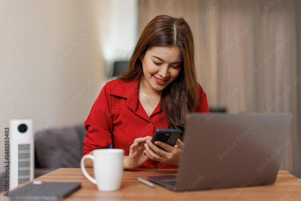 The work of a remote employee online. Young confident asian woman works with laptop analyzes startup project strategy at workplace home office.
The work of a remote employee online. Young confident asian woman works with laptop analyzes startup project strategy at workplace home office.