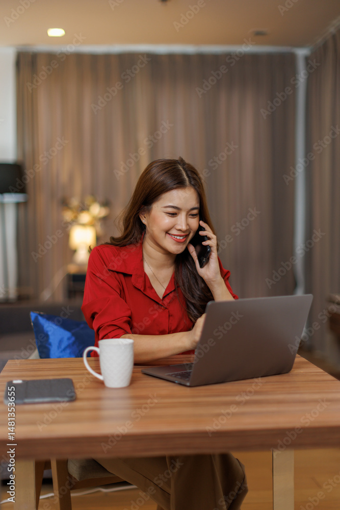 The work of a remote employee online. Young confident asian woman works with laptop analyzes startup project strategy at workplace home office.
The work of a remote employee online. Young confident asian woman works with laptop analyzes startup project strategy at workplace home office.