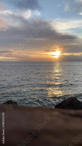 Sea with golden sun vertical video 4k