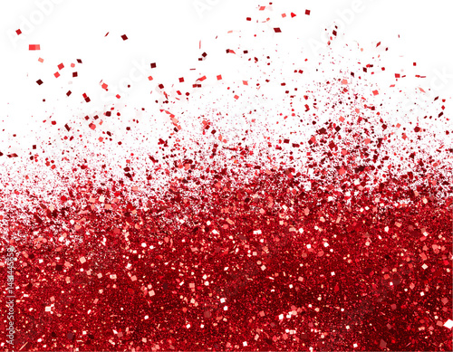 Red glitter cascading over black