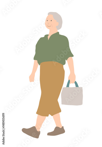 緑の半袖シャツを着た老人女性