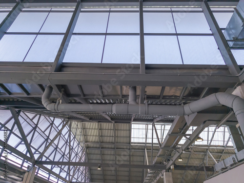 Wallpaper Mural Low angle view of restaurant roof with gutters inside the building. Torontodigital.ca