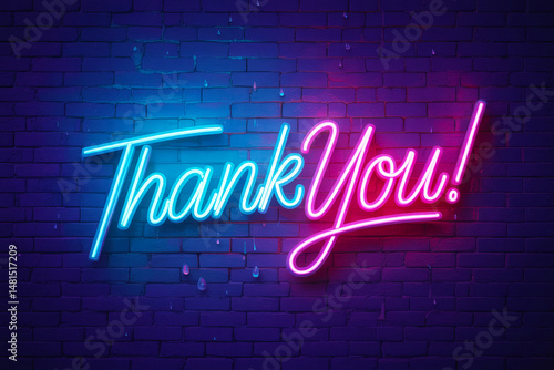 Neon 'Thank You' sign on brick wall.