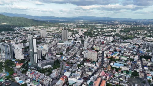 Aerial view of a vibrant city surrounded by industrial and commercial buildings. City life.