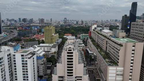 Aerial view of a vibrant city surrounded by industrial and commercial buildings. City life.