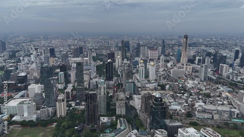 Aerial view of a vibrant city surrounded by industrial and commercial buildings. City life.