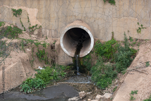 Pollution discharge outlet of large concrete pipe in the city