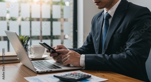 Photo of Businessman Using ...