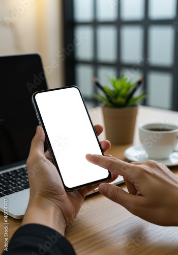 Photo of Hand Holding Phone...