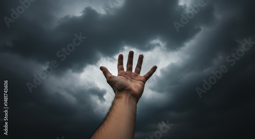 Photo of Hand Reaching Towa...