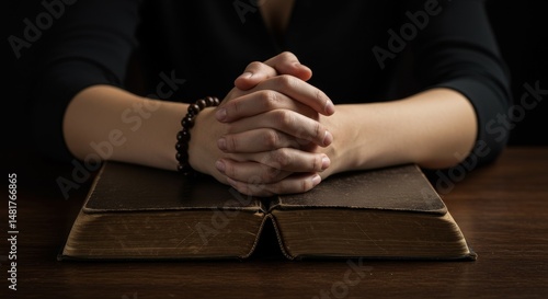 Photo of Praying Hands on B...