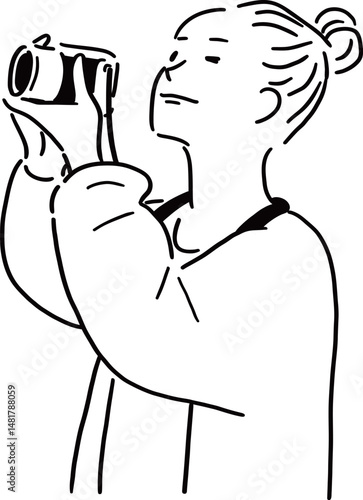 カメラで撮影する女性のイラスト