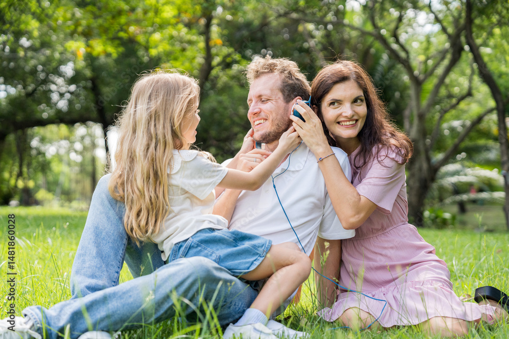 Fototapeta premium Happy family parent children having picnic outdoor activity. Enjoy happiness moment summer playing together including father mother son and daughter relaxing in the morning sunrise.