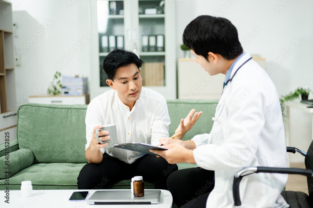 Obraz premium Caring doctor supports stressed male patient during mental health consultation on sofa. Therapy, empathy, and emotional care