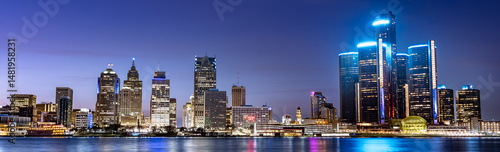 Detroit Michigan downtown city skyline over river at night panorama