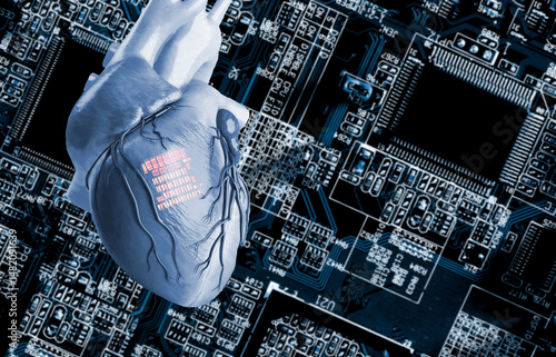 Human heart with implanted microchip, composite image