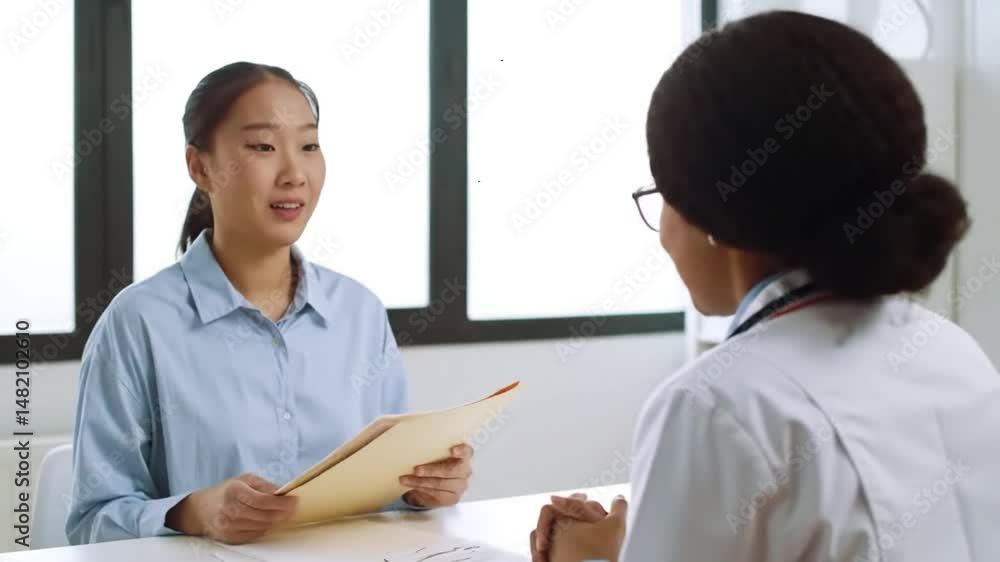 Female patient visiting doctor's office for a medical exam Female patient visiting doctor's office for a medical exam