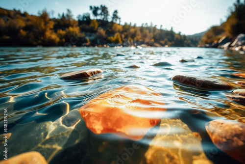 Crystal Clear River Rocks and Sunlight