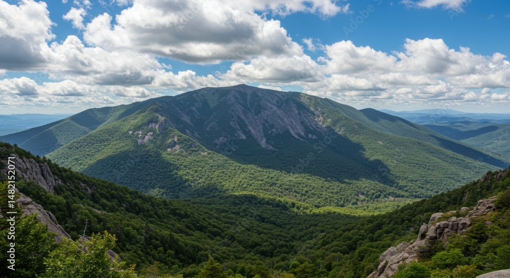 Fototapeta premium Mountain landscape showcasing natural beauty and serenity, with lush greenery and cloudy sky