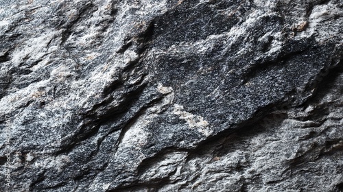 High-resolution black and white granite mountain rock surface texture background, close-up abstract stone detail for graphic design