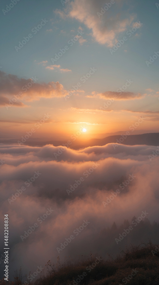 Obraz premium dramatic view of sunset glowing orange over mountain peak with fog and meadow scenic nature photography outdoor peaceful golden landscape landscape photography wallpaper background