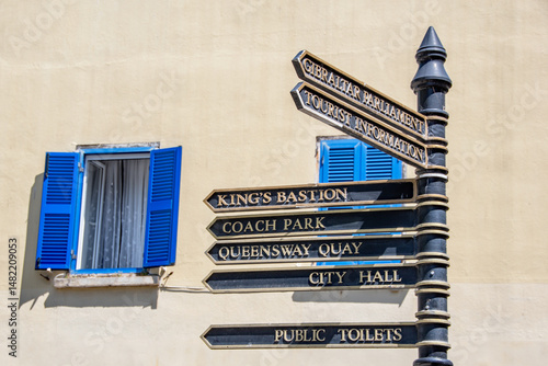 Gibraltar, UK. 05-02-25. Gibraltar signpost pointing to various attractions and locations. King's bastion, Gibraltar parliament, Queensway quay. British overseas territory.