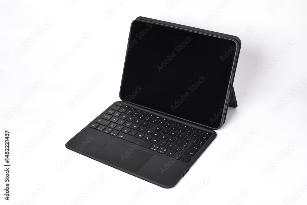 Modern tablet device with keyboard case isolated on white background Modern tablet device with keyboard case isolated on white background