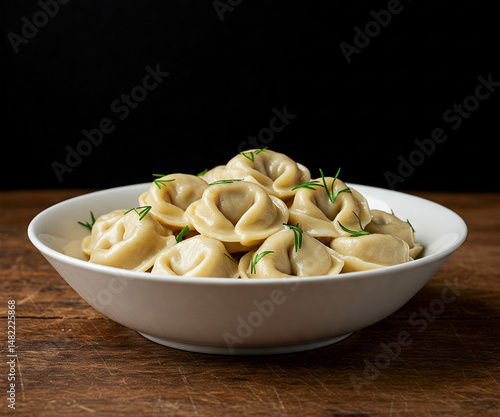 Pelmeni are Russian dumplings made of a filling wrapped in thin, unleavened dough.