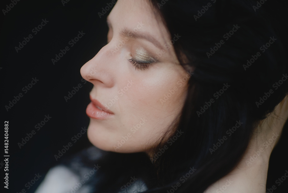 Fototapeta premium Portrait of a young woman smiling tenderly