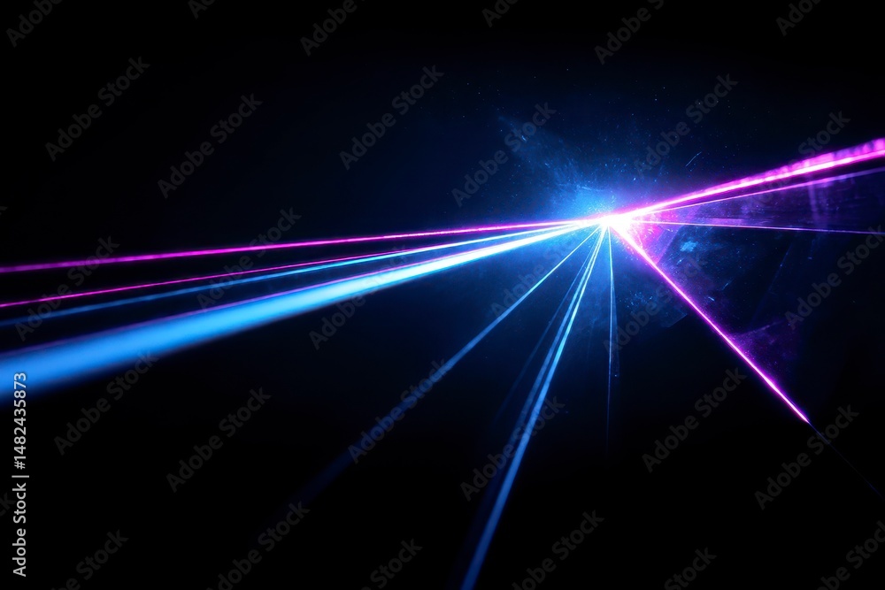 Blue and violet beams of bright laser light shining on black background