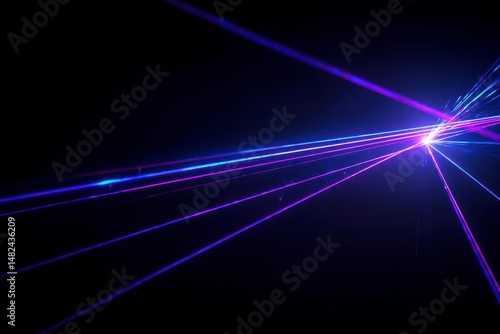 Obraz na płótnie Blue and violet beams of bright laser light shining on black background w salonie