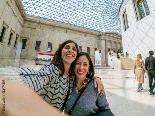 Photography Tourists taking selfie at british museum great court in london