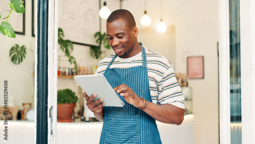 Fototapeta premium Barista, tablet and reading with black man in cafe for research, digital inventory or restaurant supply checklist. Waiter, catering review and small business owner with person in coffee shop for menu