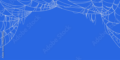 Halloween Banner with White Spider Web Frame in Hand Drawn Style Isolated on Blue Background. Doodle arachnid web perfect for cards, party invitations, web