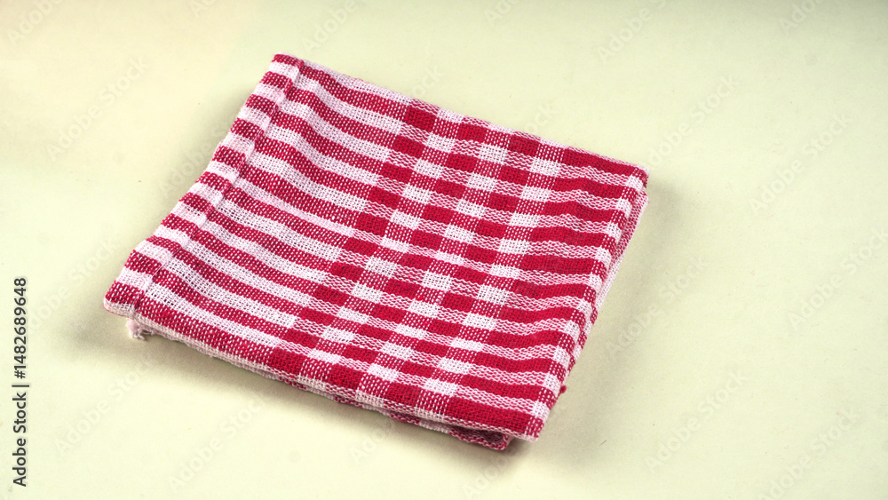 Clean sponge cloths with a checkered pattern isolated on white background. Household cleaning cloth. Closeup of cleaning rag isolated on a white background. Set of 5 sponge napkin isolated on a white. Clean sponge cloths with a checkered pattern isolated on white background. Household cleaning cloth. Closeup of cleaning rag isolated on a white background. Set of 5 sponge napkin isolated on a white.