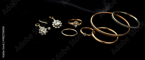 Elegant fashion jewelry display studio setting product photography dark background close-up glamorous aesthetics