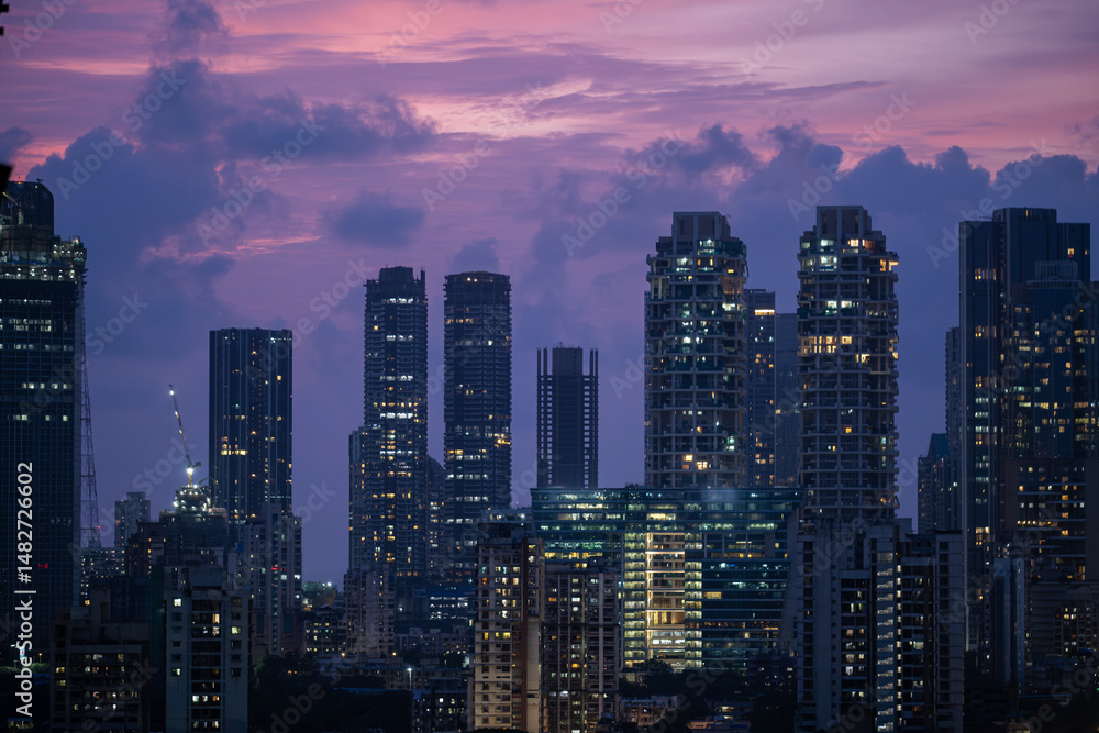 Cinematic view of Mumbai city at night. Mumbai's iconic financial district with this stunning cityscape view. Shot of Mumbai Skyline, high-rise buildings at South Mumbai, Maharashtra India. Cinematic view of Mumbai city at night. Mumbai's iconic financial district with this stunning cityscape view. Shot of Mumbai Skyline, high-rise buildings at South Mumbai, Maharashtra India.