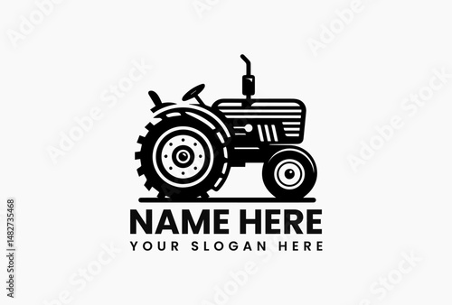 Simple black and white silhouette of a vintage tractor with large wheels on a clean white background. Agriculture concept