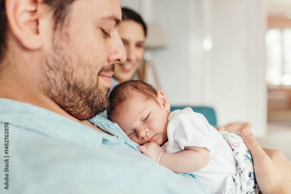 Newborn baby girl sleeping on father's chest Newborn baby girl sleeping on father's chest