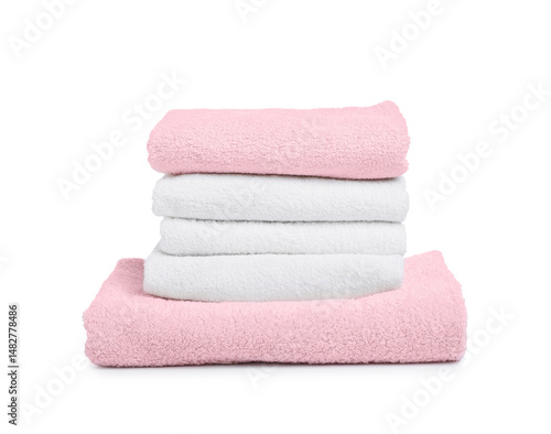 Stack of clean towels isolated on white