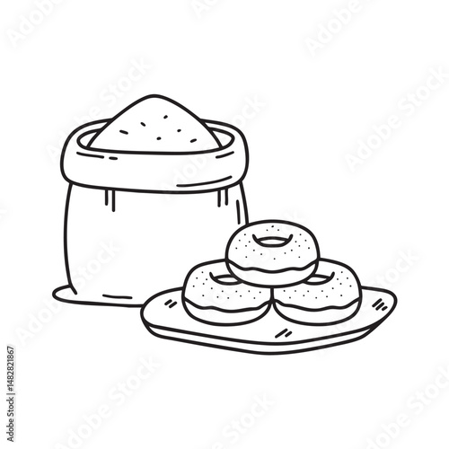 A tapioca flour sack beside freshly fried donuts on a wire rack