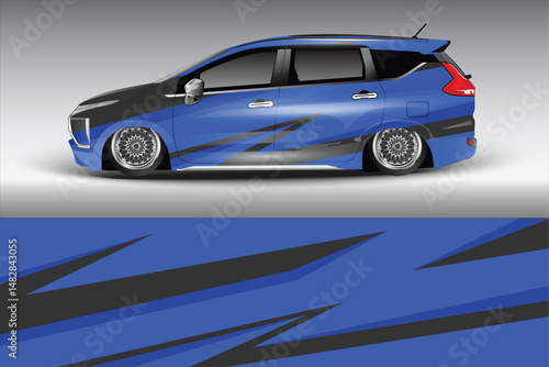 Sleek blue modified car with striking graphics