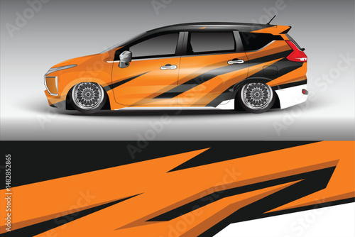 Stylish orange car design with dynamic graphics displayed